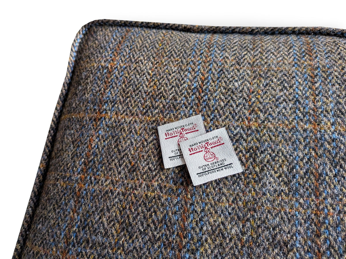 A Harris Tweed pure new wool fabric bench cushion in a dark khaki green herringbone woven plaid fabric with burnt orange and blue stripes. Wool fabric from Scotland in a traditional tartan pattern. Piped bench cushion in natural fabric. Firm foam inside with dacron wrapping. Zipper bench cushion cover. Window seat cushion made to measure. Camper van cushions in harris tweed cloth. Thick upholstery cushion for window seat cushion. MCM cushion mid century modern sofa settee. Monks bench cushion
