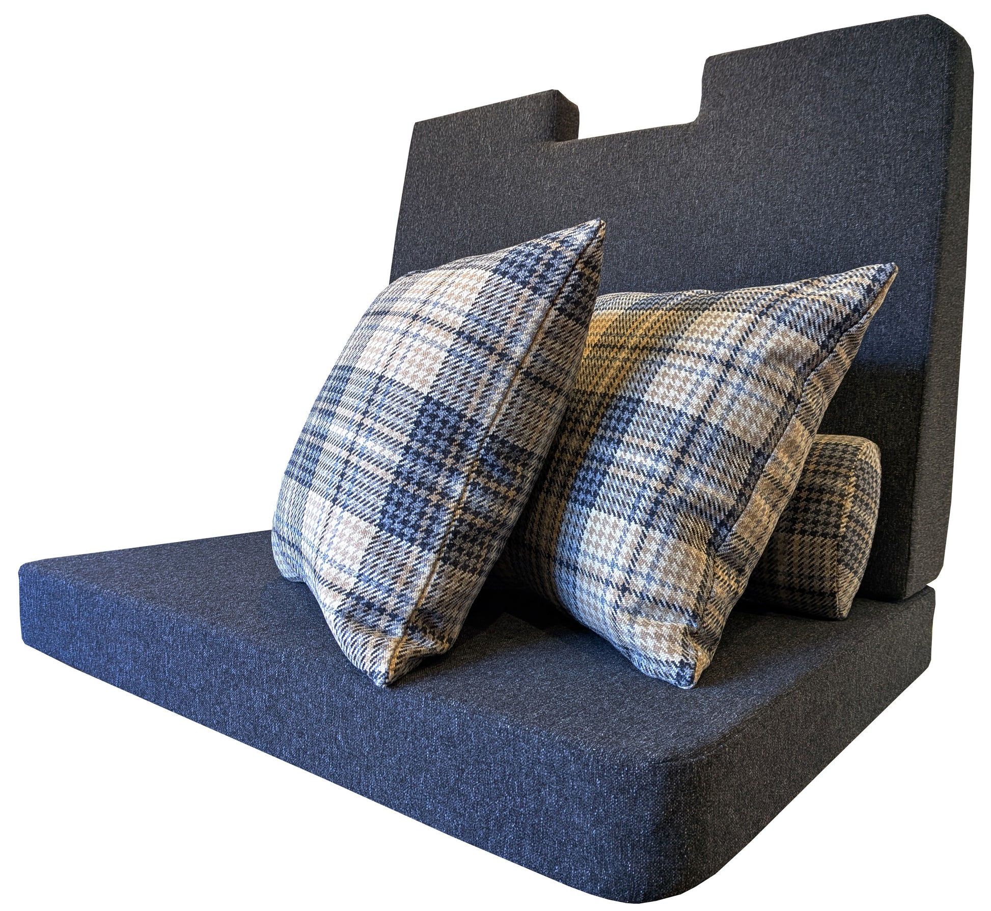 A back and seat cushion for a motor home seating area. Shaped to fit around a seatbelt column. Spacer cushions at the back of the slanted, comfortable firm foam back cushion to make the seat level for the back rest. Dark grey stain resistant, machine washable fabric covers made to measure for campervan seating. Firm foam for good support. Cut outs at head rest area to fit the wooden seats. Curved corners. Zips at the back of the covers for removal. Velcro strips to keep cushions in place. 