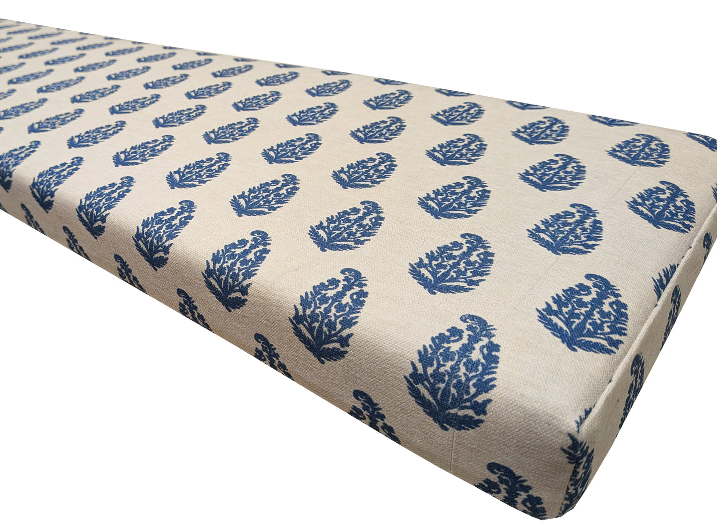 A custom made bench cushion with firm foam inside and a cover made with Pure Edit cream and navy blue botanical patterned fabric. Zipped cover for bench cushion for a shoe bench. Natural cotton fabric bench cushion cover, made to measure. Cut outs for monks bench arm. Same fabric ties to keep cushion in place on dining bench. Designer fabric bench cushion and back cushion pad. Hanging bar back cushion, bolster cushion. French chic country farmhouse seating cushions with zip. Machine washable