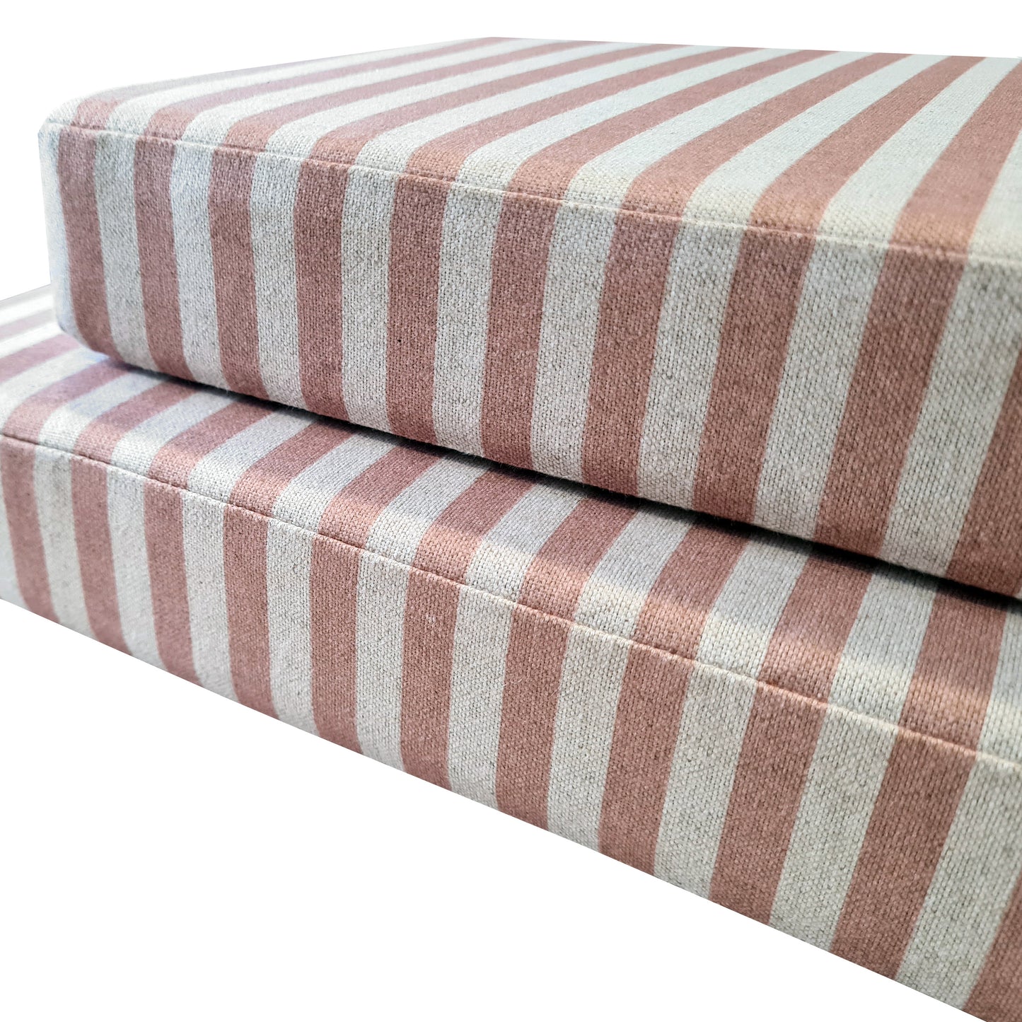 Two thick, high quality bench cushions made with pink and white striped fabric. The candy stripe upholstery fabric is a cotton and linen mix fabric with a natural look. The bench cushions have zips at the back of the cushion covers so they can be removed for cleaning. The modern looking banquette seating cushions have no piping on the edges. The pink and white wide stripe cotton fabric has a stain resistant finish making it perfect for use in kitchens, around kids and pets and children.
