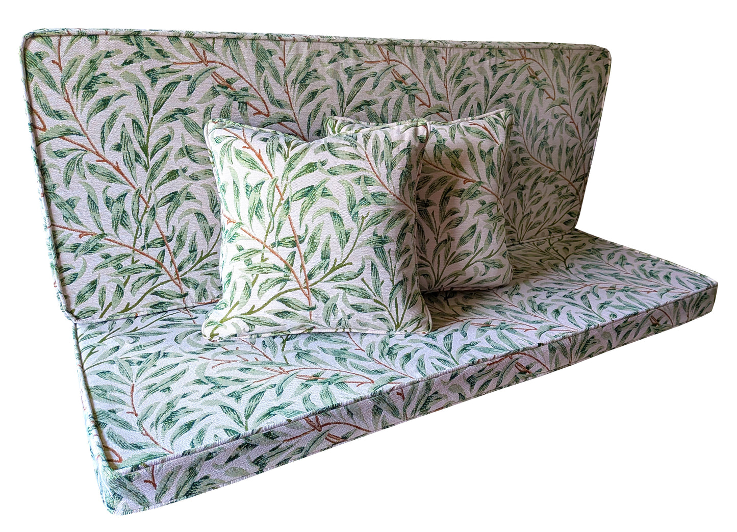 A back seat pad and a bench seating cushion for a banquette dining room bench seat. Thin firm foam box edge cushions in William Morris patterned tapestry fabric in Willow Bough in green on a white background. Piped edges bench cushion made to measure in designer fabric. Stain resistant, firm safe seating cushions for window seat, shoe bench, monks bench, church pew cushions. Storage bench wooden in built cupboard seat bench cushion made to measure. Machine washable covers. Scatter cushions