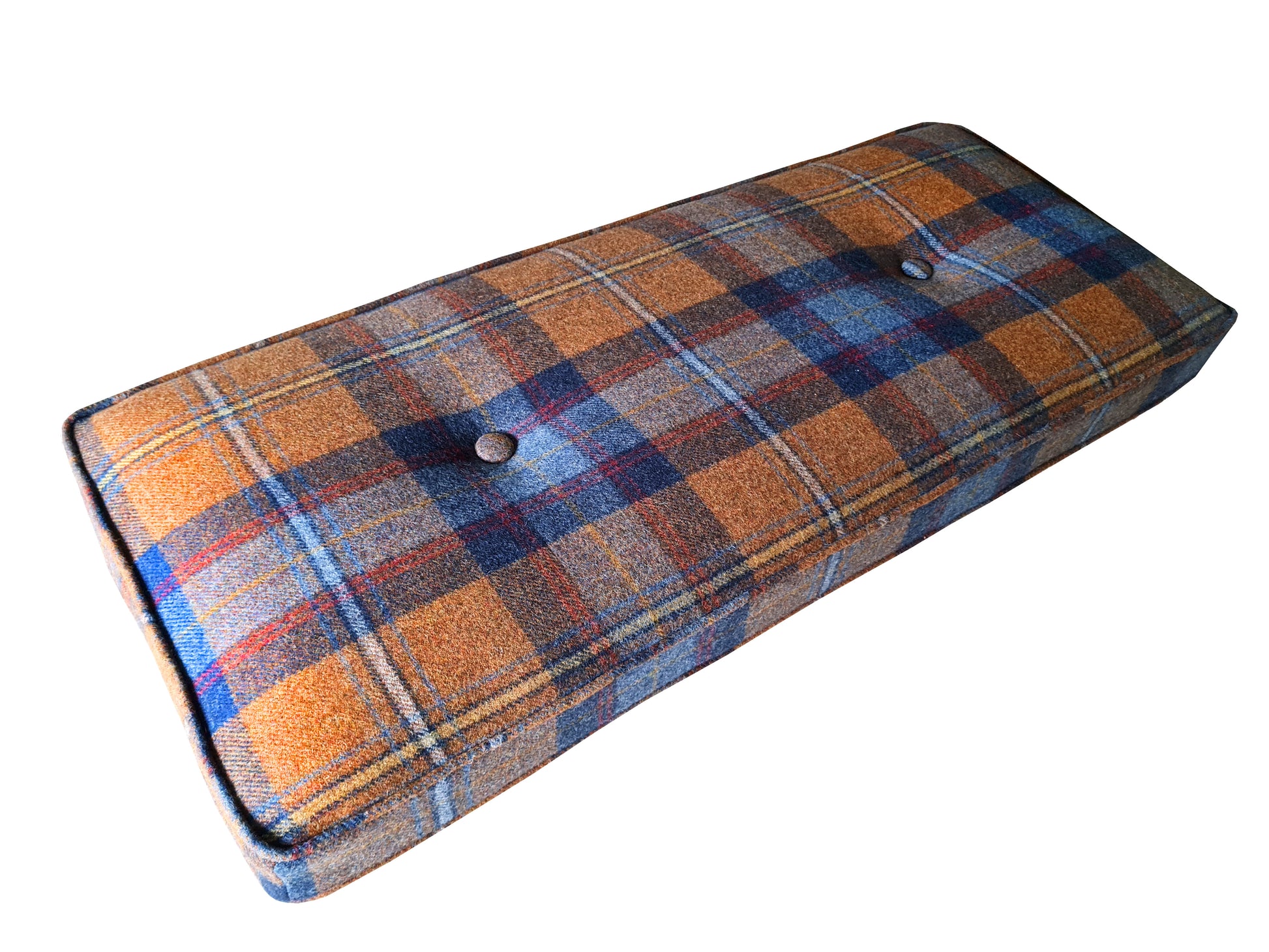 A small bench cushion. It has a handmade cover made with a 100% wool tartan fabric in a burnt orange, blue and red check pattern. The seating cushion has firm, quality foam inside with a dacron wrap to plump out the cushion and make it look very comfortable. The bench cushion has piping at the edges and has been hand tufted with buttons in the same wool upholstery fabric. The cushion is neat and well made. The bench cushion has been made to measure using customer's measurements.